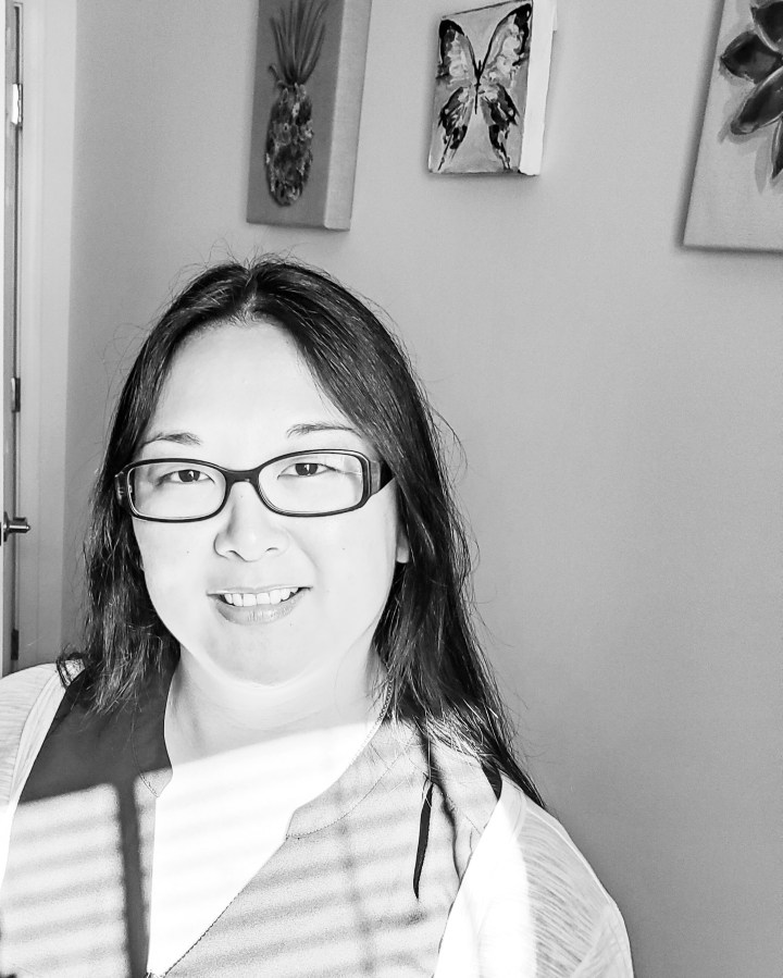 B&W image of Asian woman.